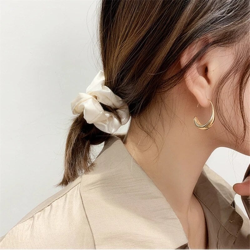 Luxurious Earrings Made of Gold and Silver